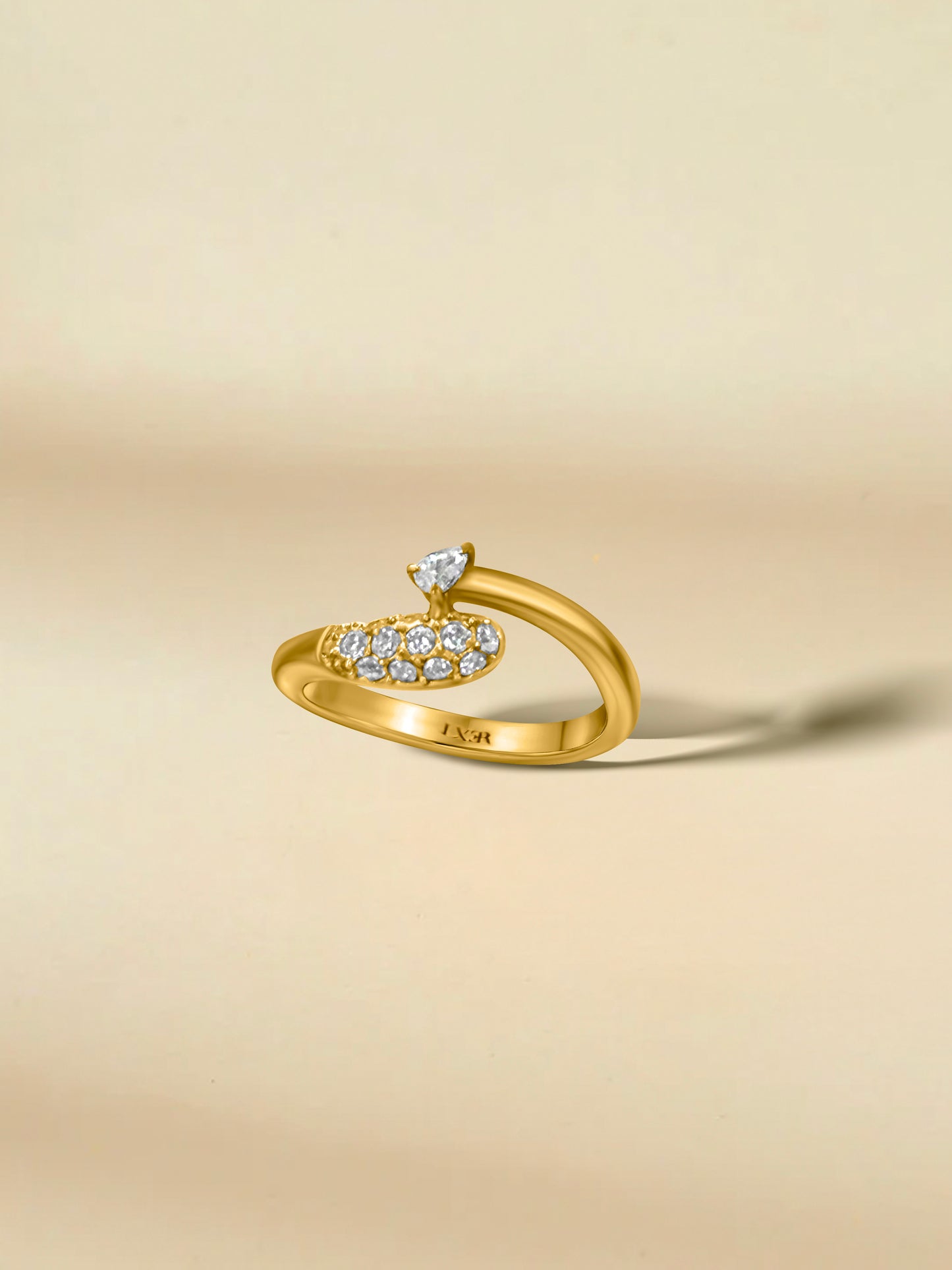 Elegant gold ring featuring sparkling diamond accents in a modern design.