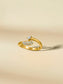 Elegant gold ring featuring sparkling diamond accents in a modern design.